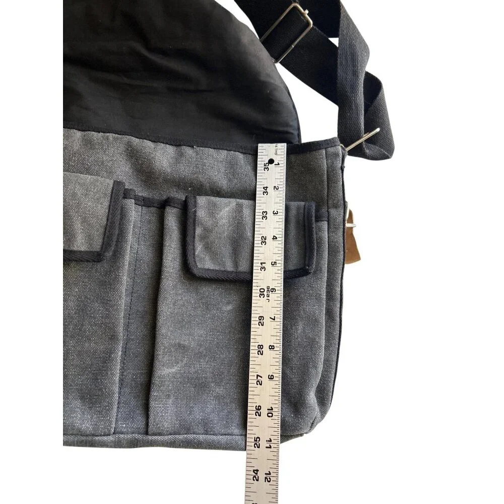 Universal Studios Canvas Messenger Bag With Adjustable Strap & Leather Accents